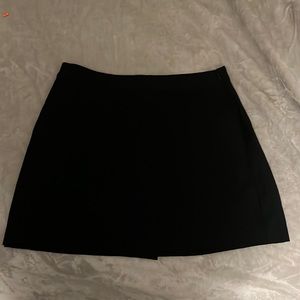 Black skirt from Target, size 10 women’s. Has side zipper and pockets!